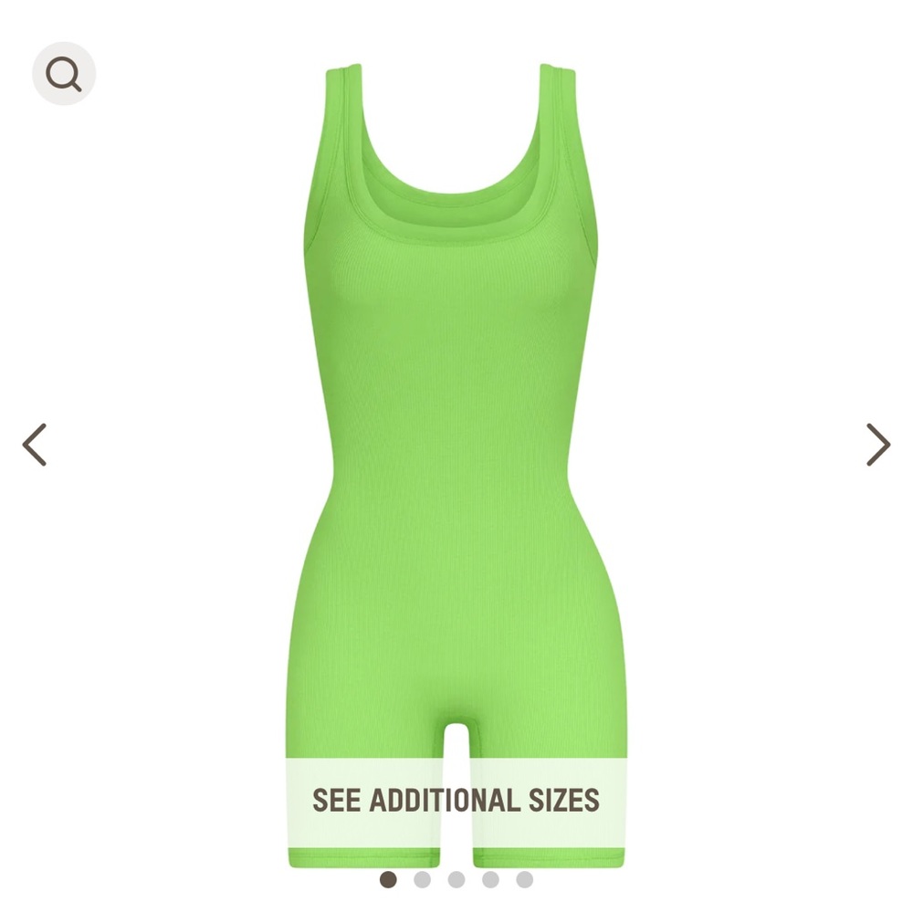 Neon green onesie size medium worn 3/4 times.